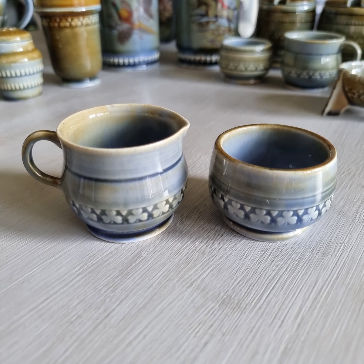 Wade Irish porcelain creamer and sugar bowl duo with blue glaze and raised shamrock bands