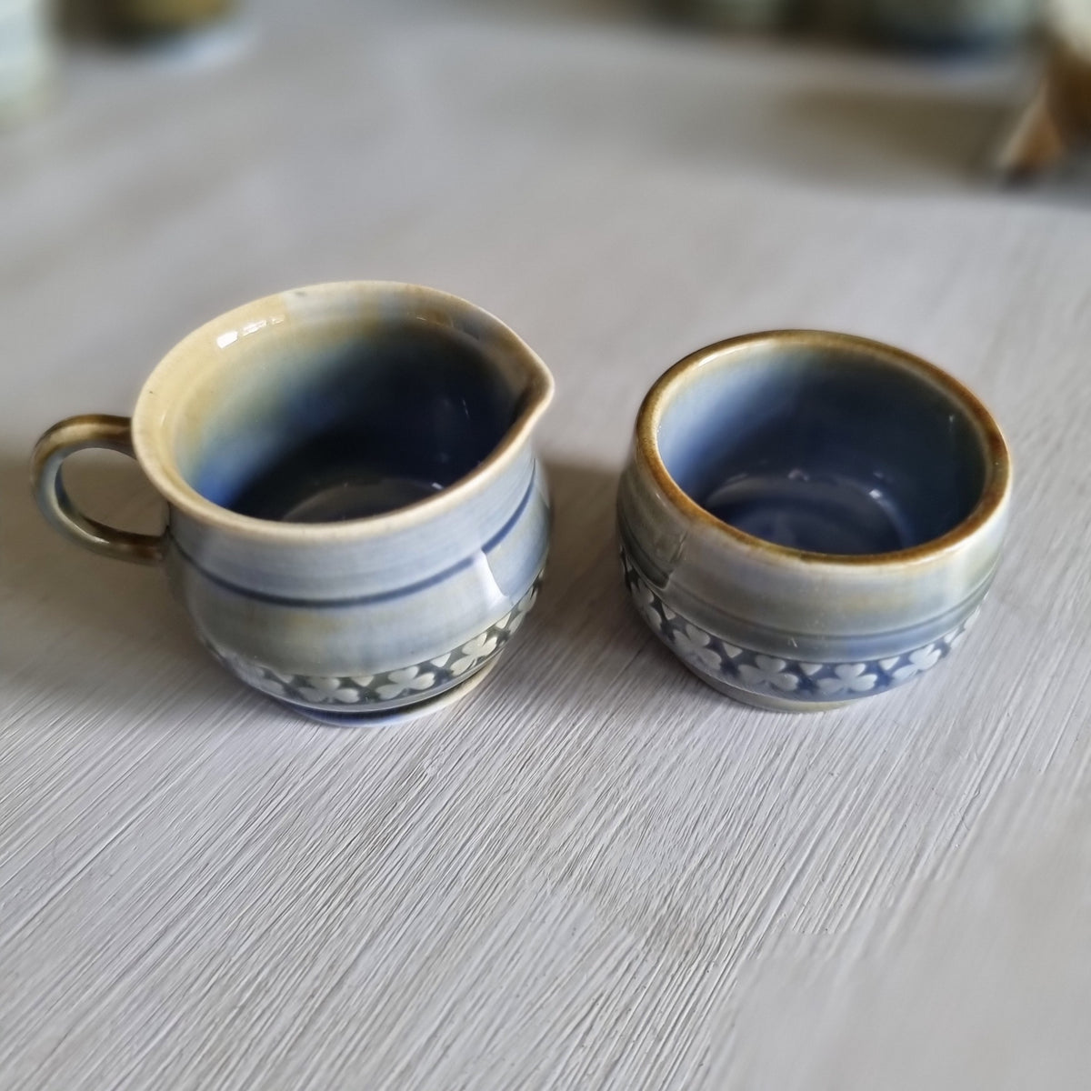 Wade Irish porcelain creamer and sugar bowl duo with blue glaze and raised shamrock bands