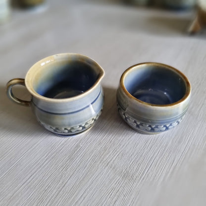 Wade Irish porcelain creamer and sugar bowl duo with blue glaze and raised shamrock bands