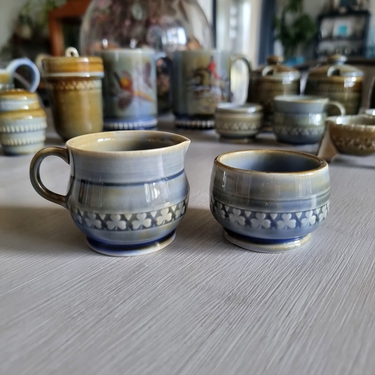 Wade Irish porcelain creamer and sugar bowl duo with blue glaze and raised shamrock bands