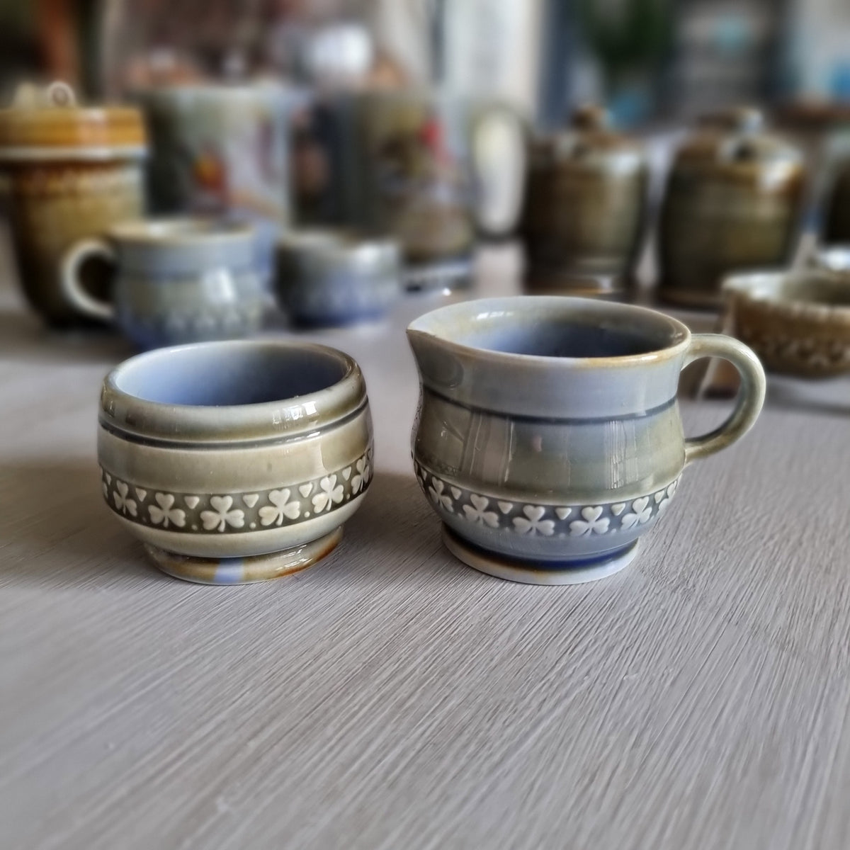 Second Wade Irish porcelain cream jug and sugar bowl duo with blue glaze and shamrock bands