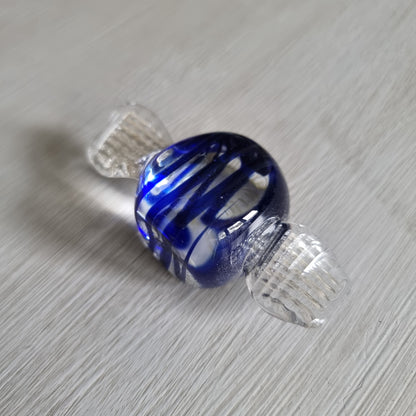Blue and clear glass wrapped lolly ornament with cobalt swirls