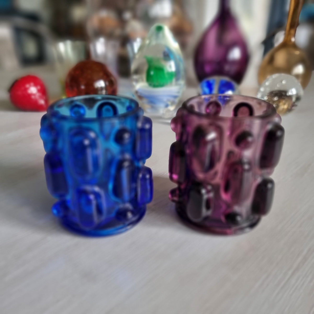 Pair of blue and purple Japanese Bond Ware glass votive candle holders