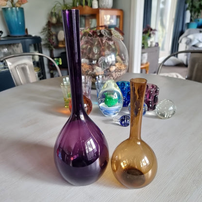 Pair of mid-century Swedish glass bulb vases in purple and amber