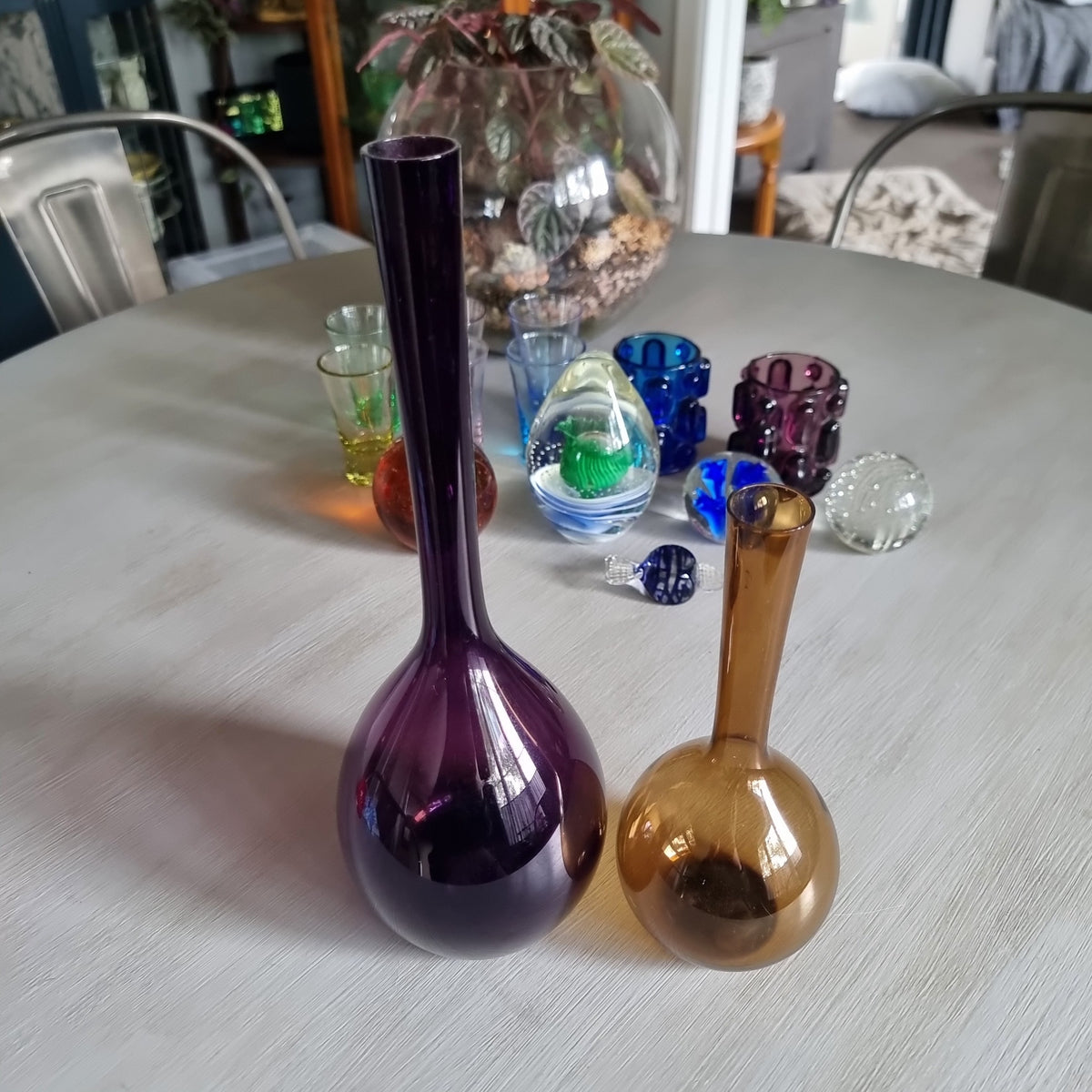 Pair of mid-century Swedish glass bulb vases in purple and amber