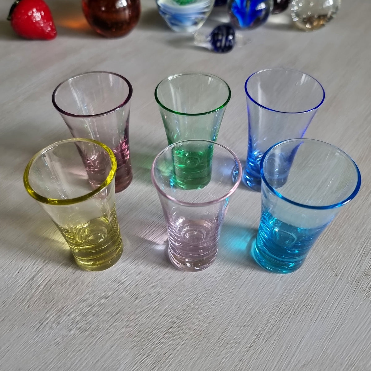 Set of six multicoloured glass shot glasses