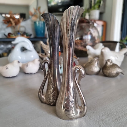 Pair of tall silver plated bud vases with swan handles and fluted tops