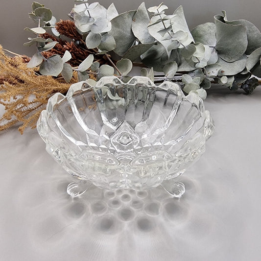 Vintage glass bowl with legs